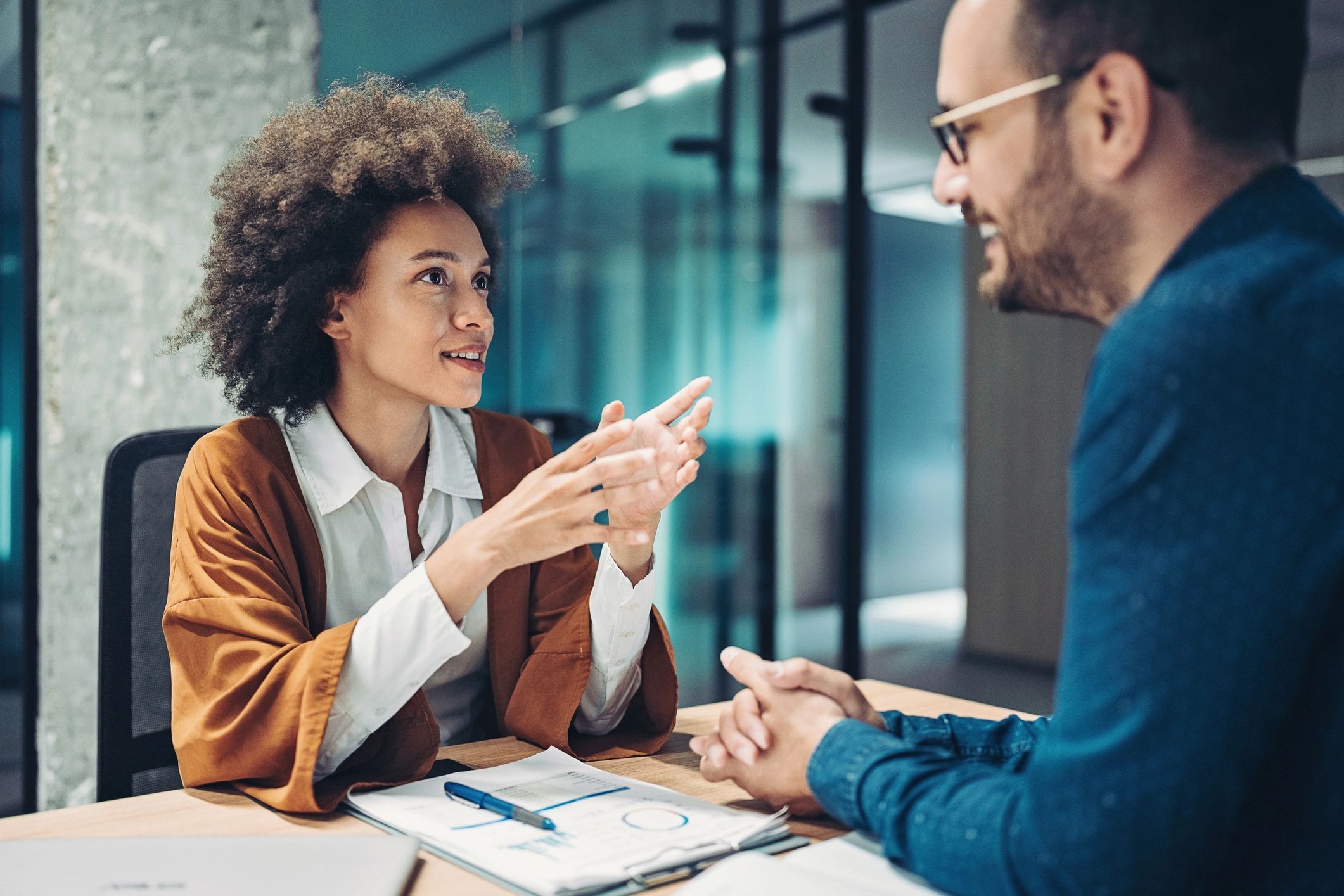 Recruiter meeting with job candidates in an office