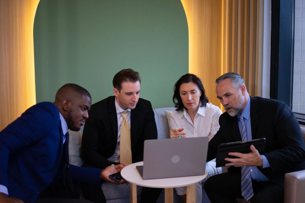 Group of white collar workers are working and meeting at office.